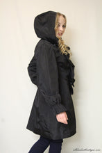 Firmiana | Black Zip Up Rain Jacket with Ruffles